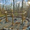 Outdoor fire pit with swings