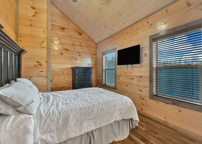 Private king bedroom with TV in 5 bedroom cabin