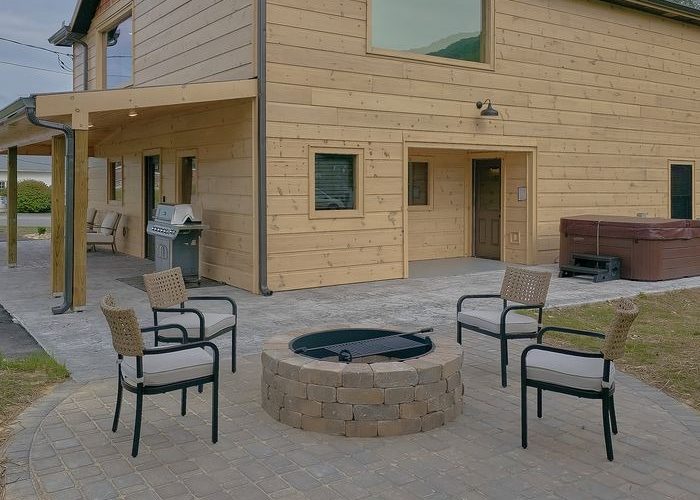 Outdoor fire pit, grill and seating to enjoy the mountain air